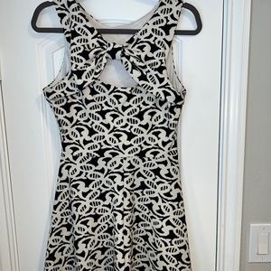 Black and white high neck bow back charming Charlie dress size M